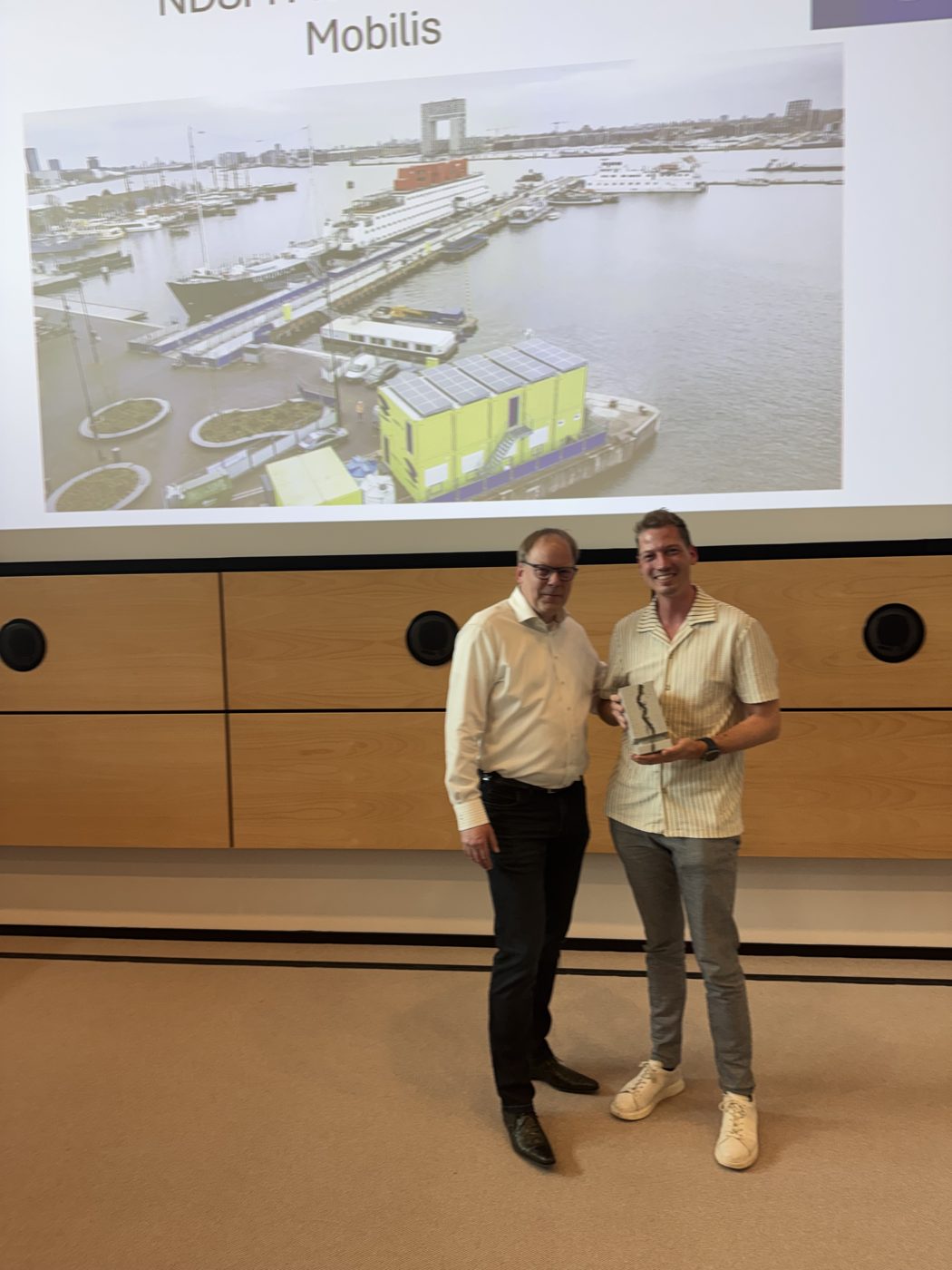 Presentatie van het winnende project NDSM Pier in Amsterdam van Mobilis TBI